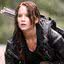 Jennifer Lawrence interpretando Katniss Everdeen na franquia "Jogos Vorazes"